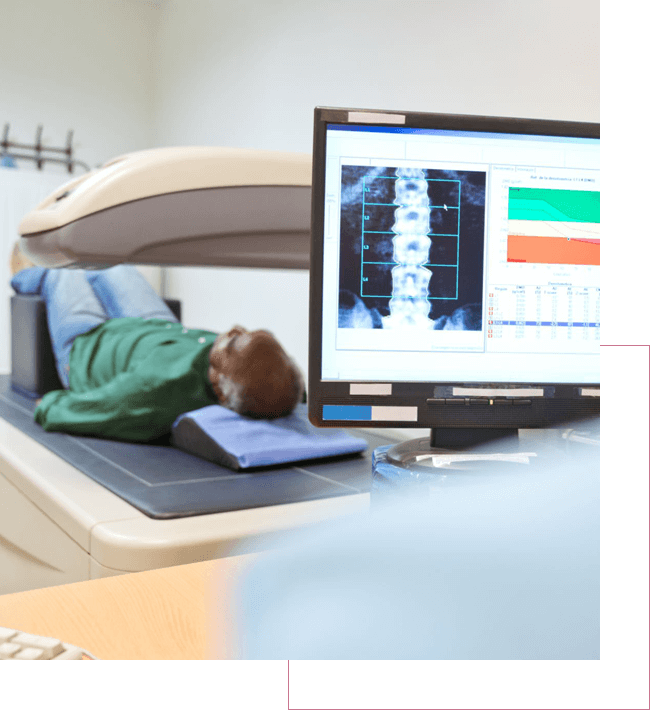 Bone density scan being done to a male patient