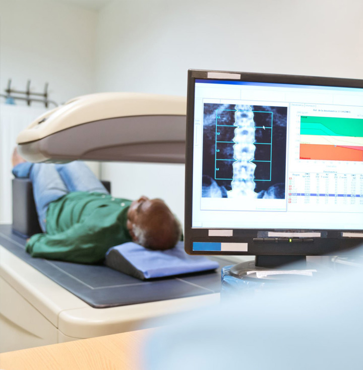 Bone density scan being done to a male patient